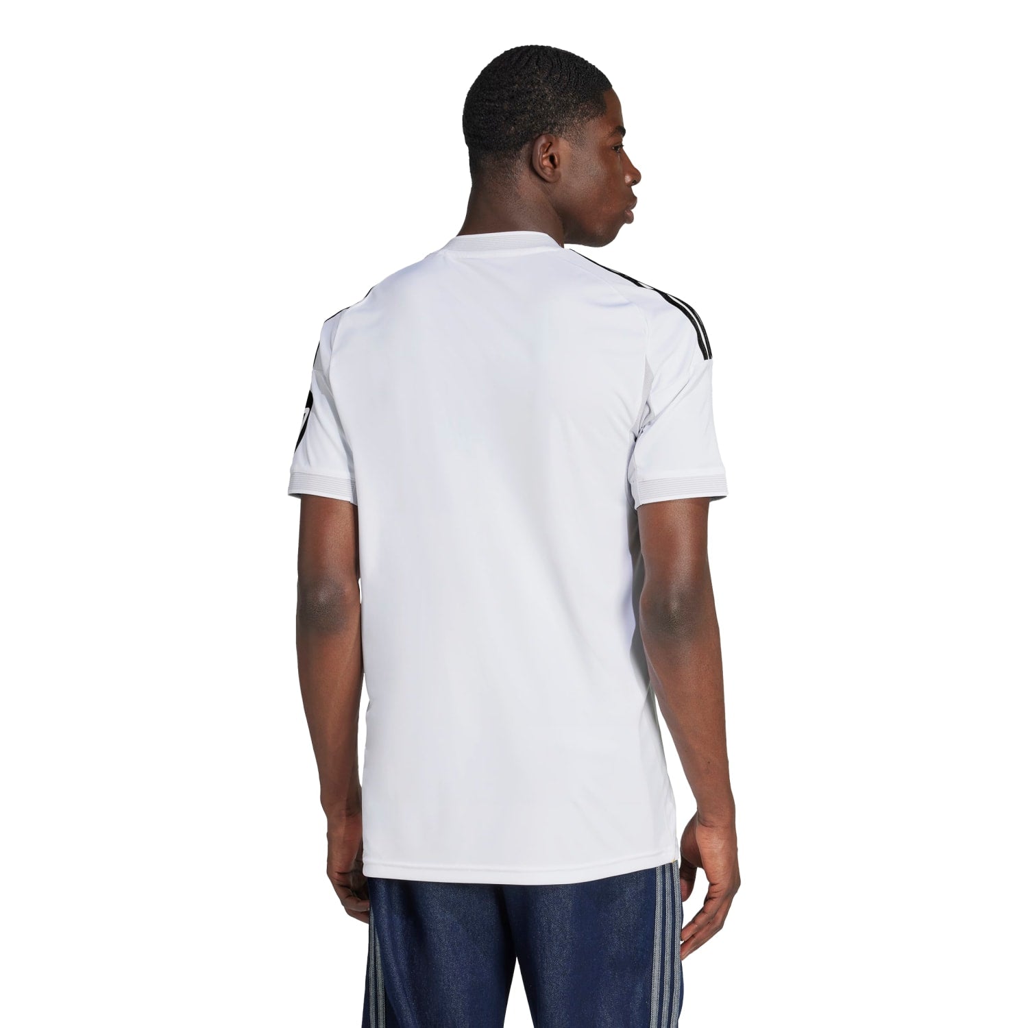 Close-up of the fabric and stitching of the 2025 Real Madrid jersey, highlighting quality