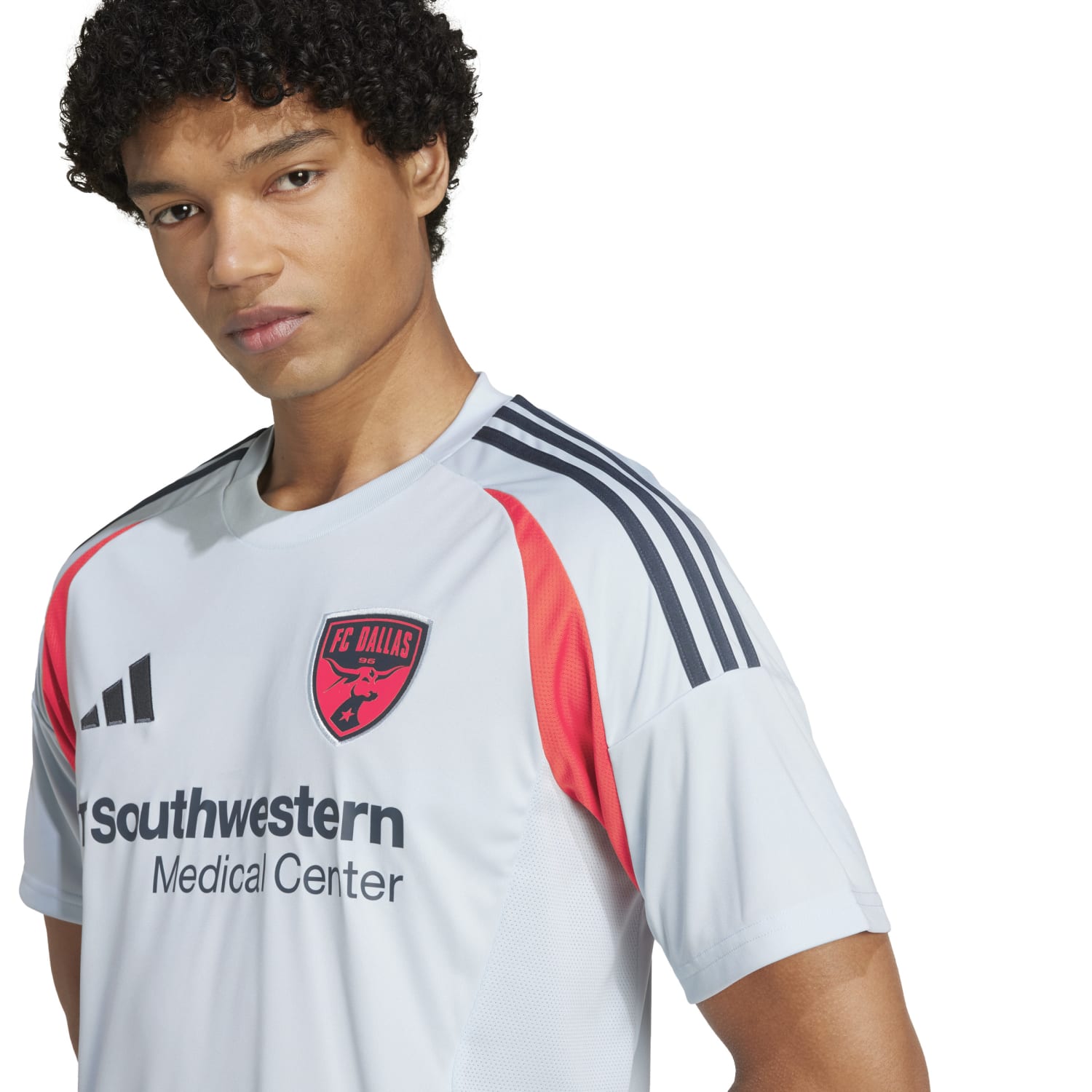 Front view of Dallas FC 2025/26 Replica Away Jersey, showcasing team crest and vibrant colors.