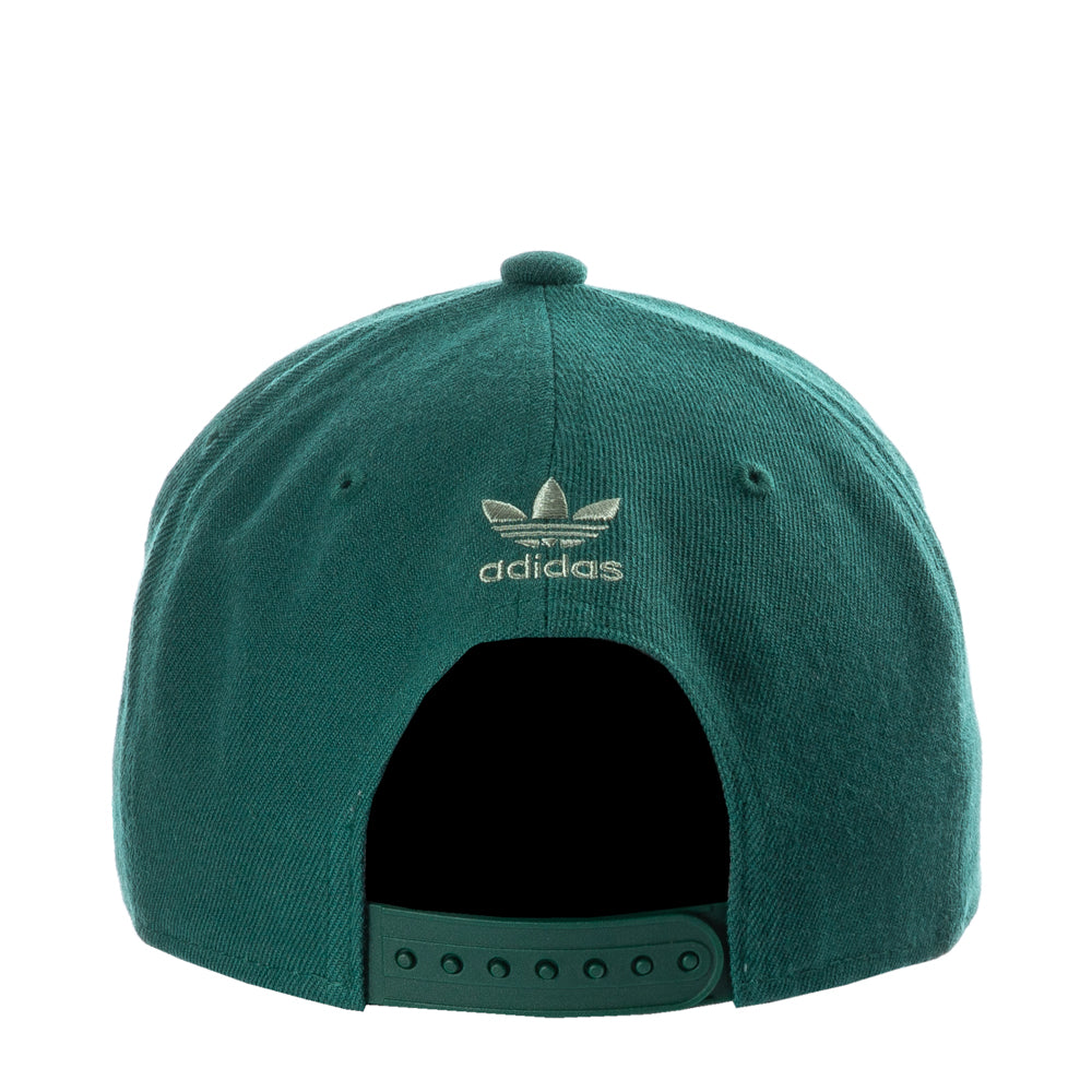 Side angle of the Adidas Trefoil Snapback Cap worn casually, emphasizing its adjustable fit and stylish design.