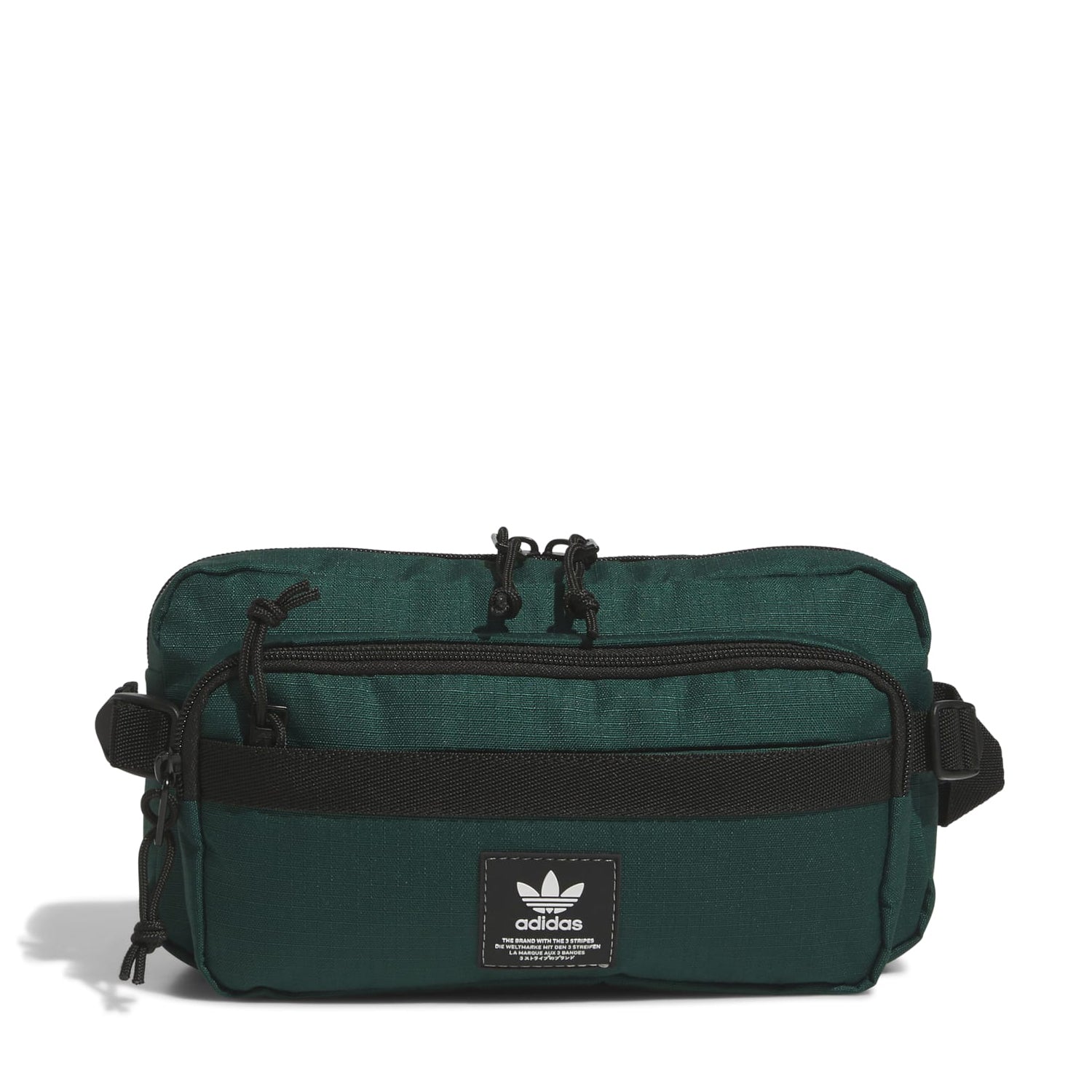 Close-up of Adidas Originals Rectangle 2.0 Crossbody Bag showing zipper compartments and fabric texture