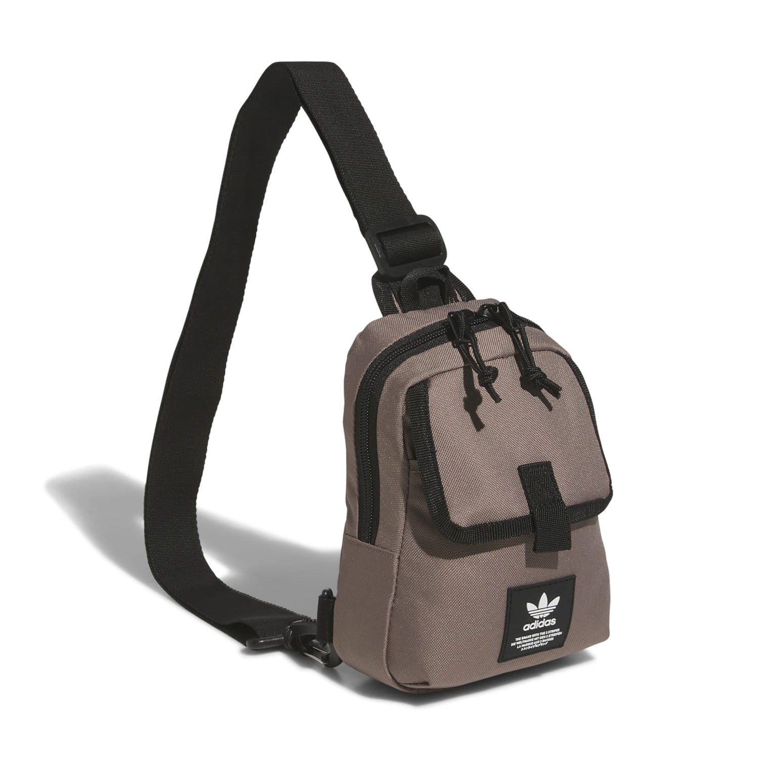 Close-up of the mini sling bag showing its adjustable strap and sleek design