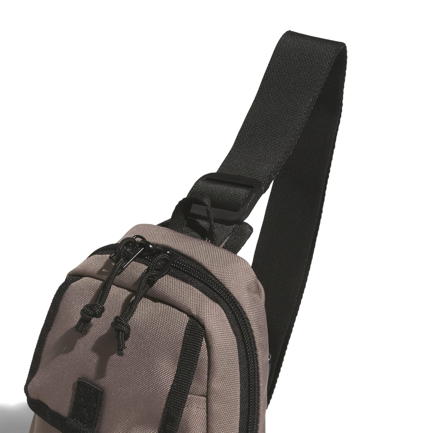 Interior view of the utility sling bag displaying organized compartments