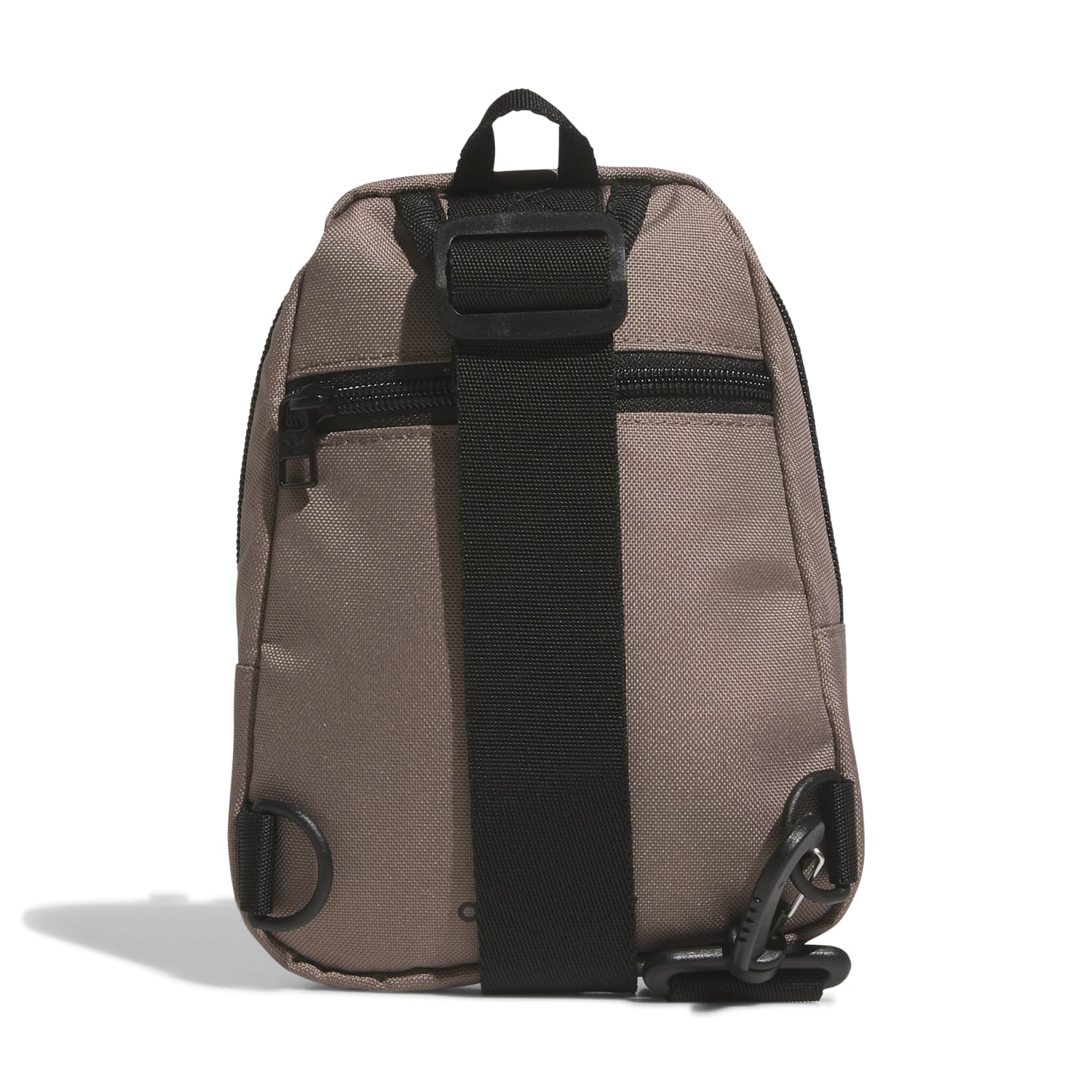 Close-up of the mini sling bag showing its adjustable strap and sleek design