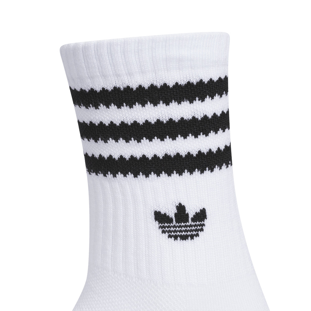Front view of kids wearing colorful crew socks from the Originals Remix 4.0 pack