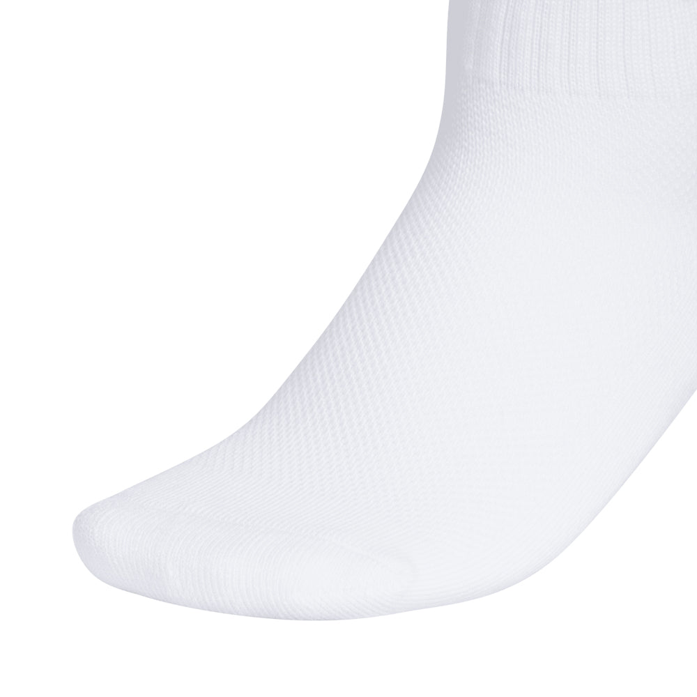 Kids wearing youth crew socks in active play, showcasing comfort and style