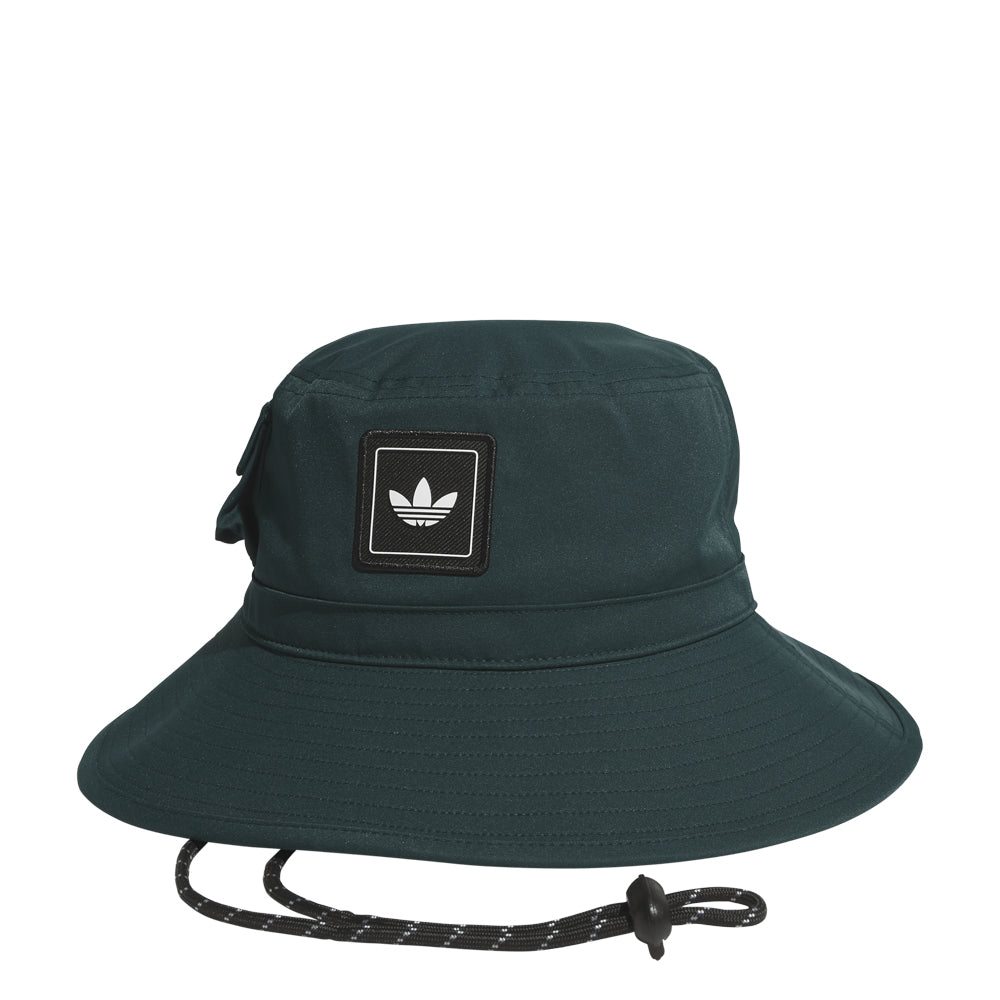 Ultimate Utility Boonie Hat in action during a fishing trip, showcasing its wide brim and stylish design.