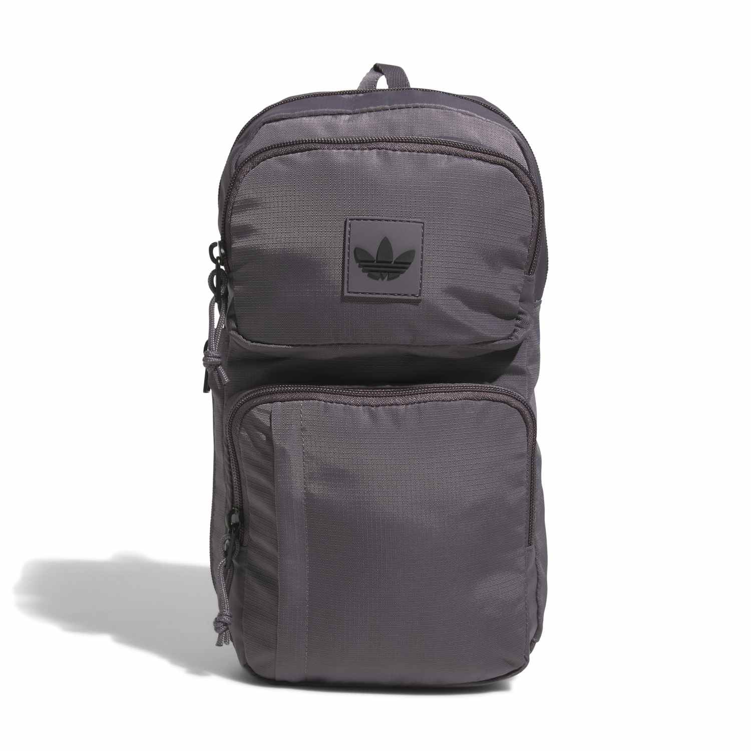 Adventure Utility Sling Bag showcasing versatile use in hiking.