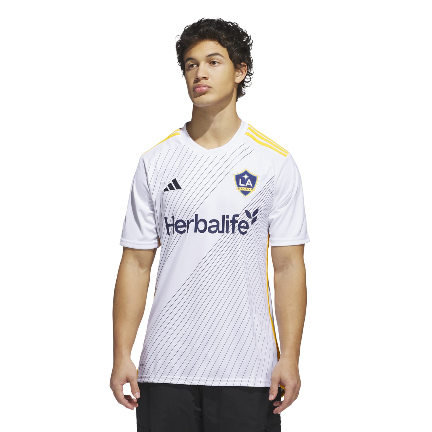 Fan wearing Galaxy 25/26 team jersey at stadium