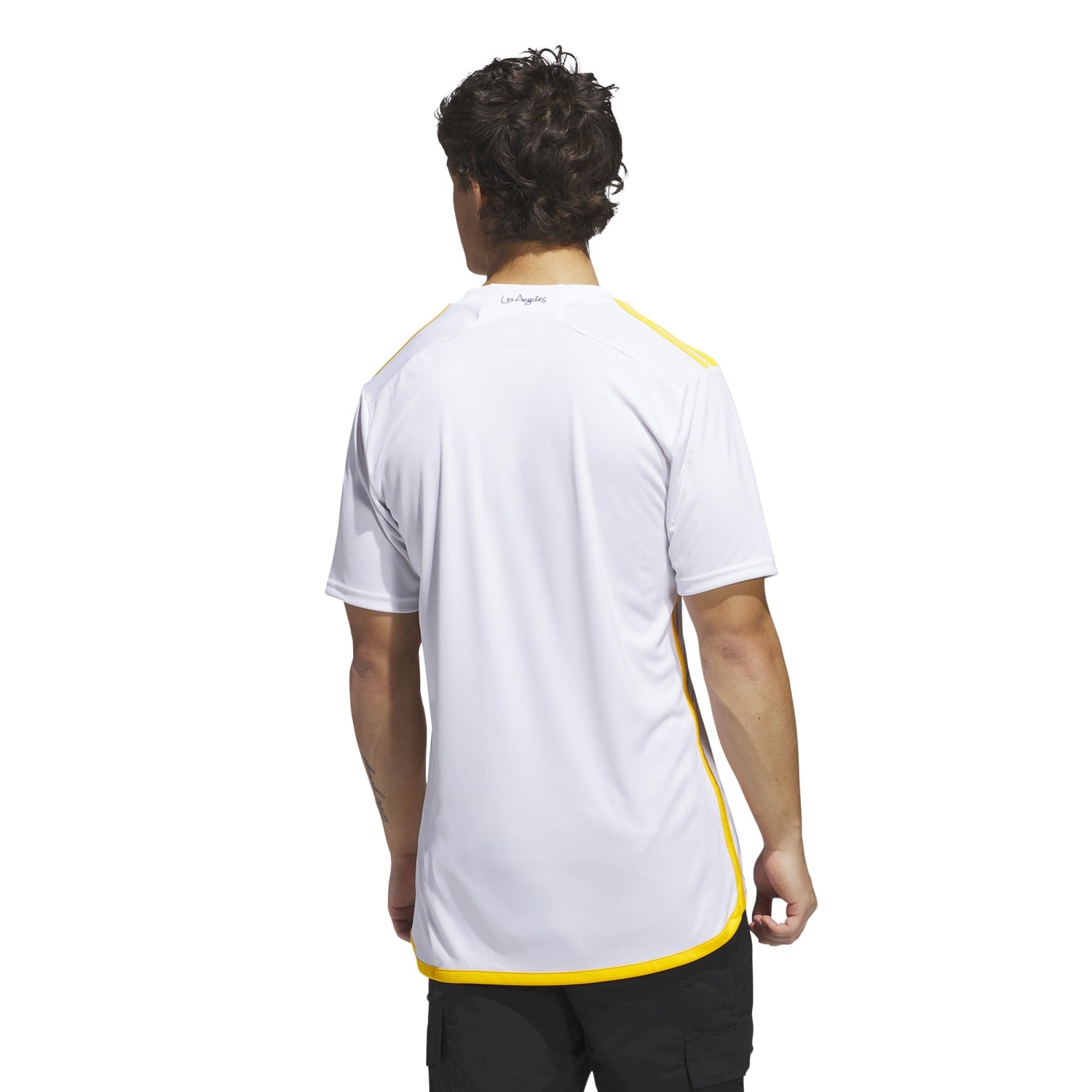 Close-up of the jerseys team logo and adidas detailing
