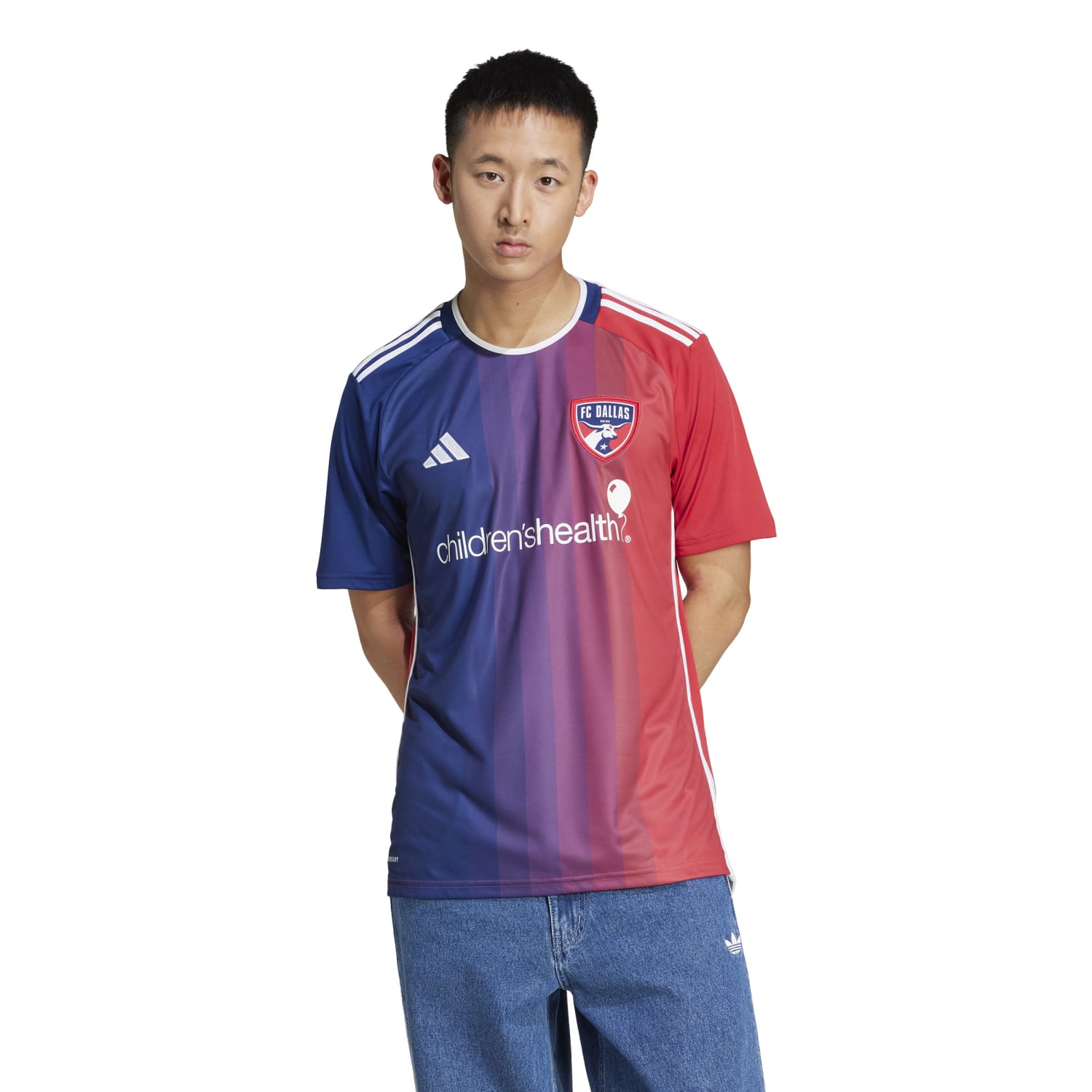 Side angle of the Dallas FC jersey, demonstrating the lightweight material and adidas 3-stripe logo.