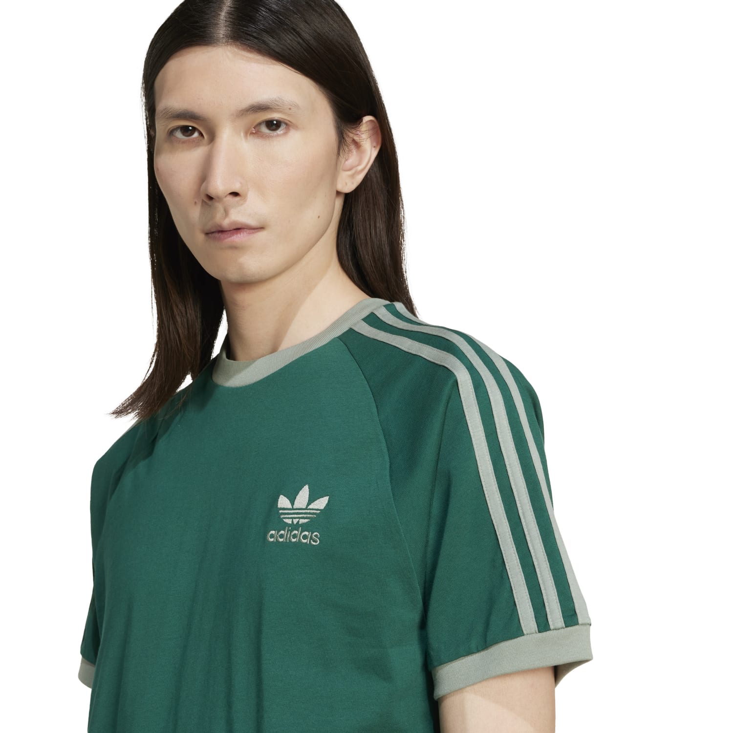 Close-up of mens vintage style t-shirt with 3-stripes and embroidered logo
