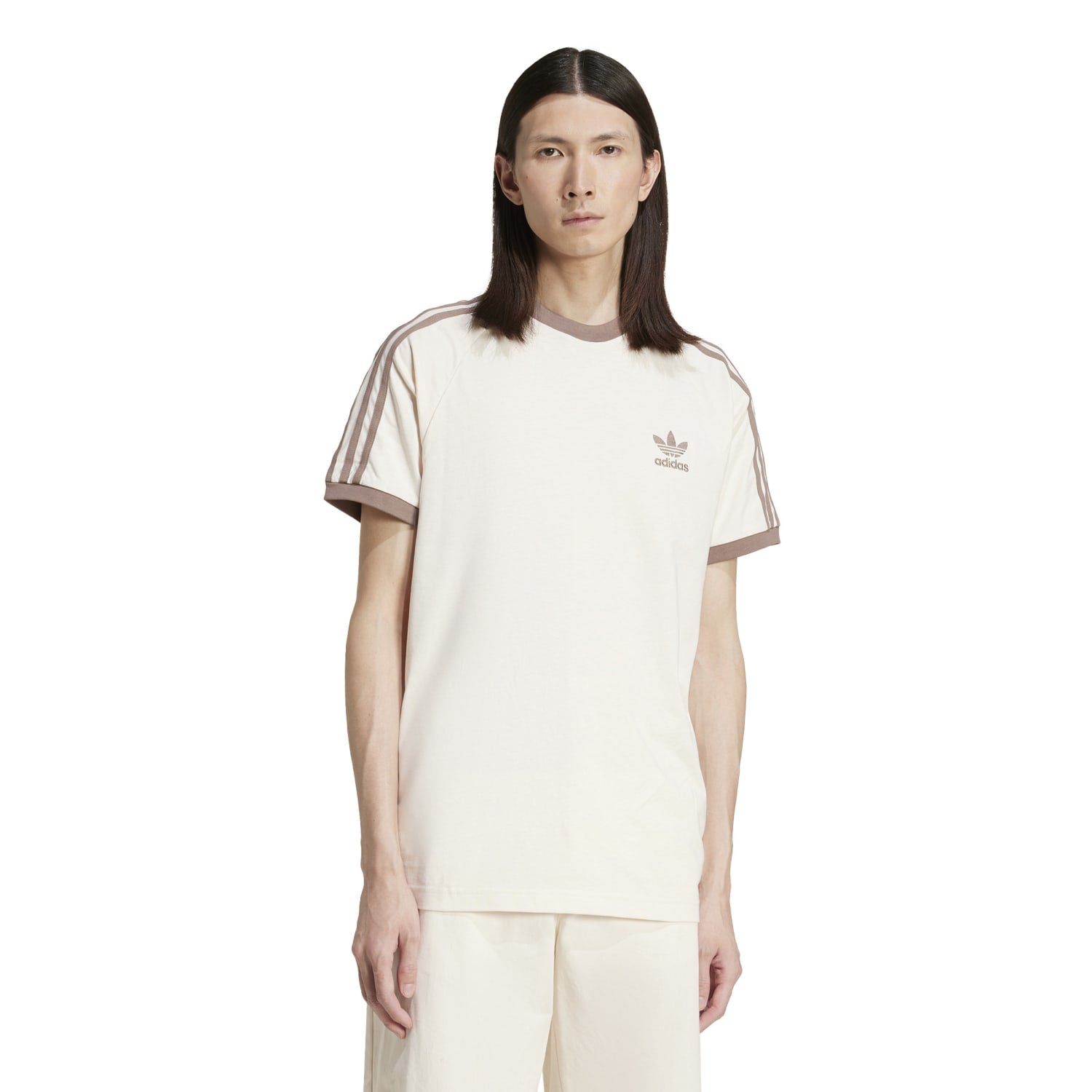 Close-up of the ribbed crewneck and embroidered Trefoil logo on adidas mens t-shirt