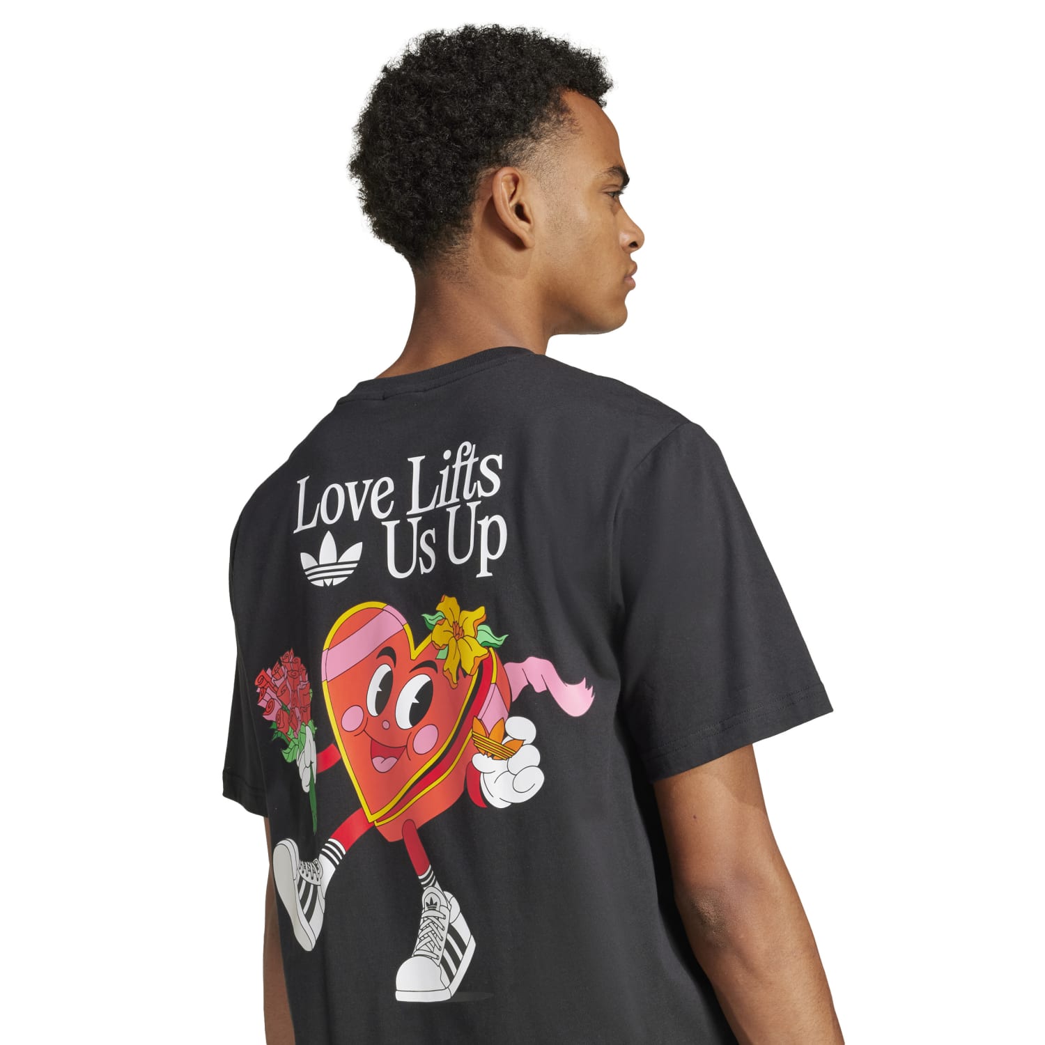 Close-up of the crew neck Adidas youth t-shirt featuring a fun character graphic.
