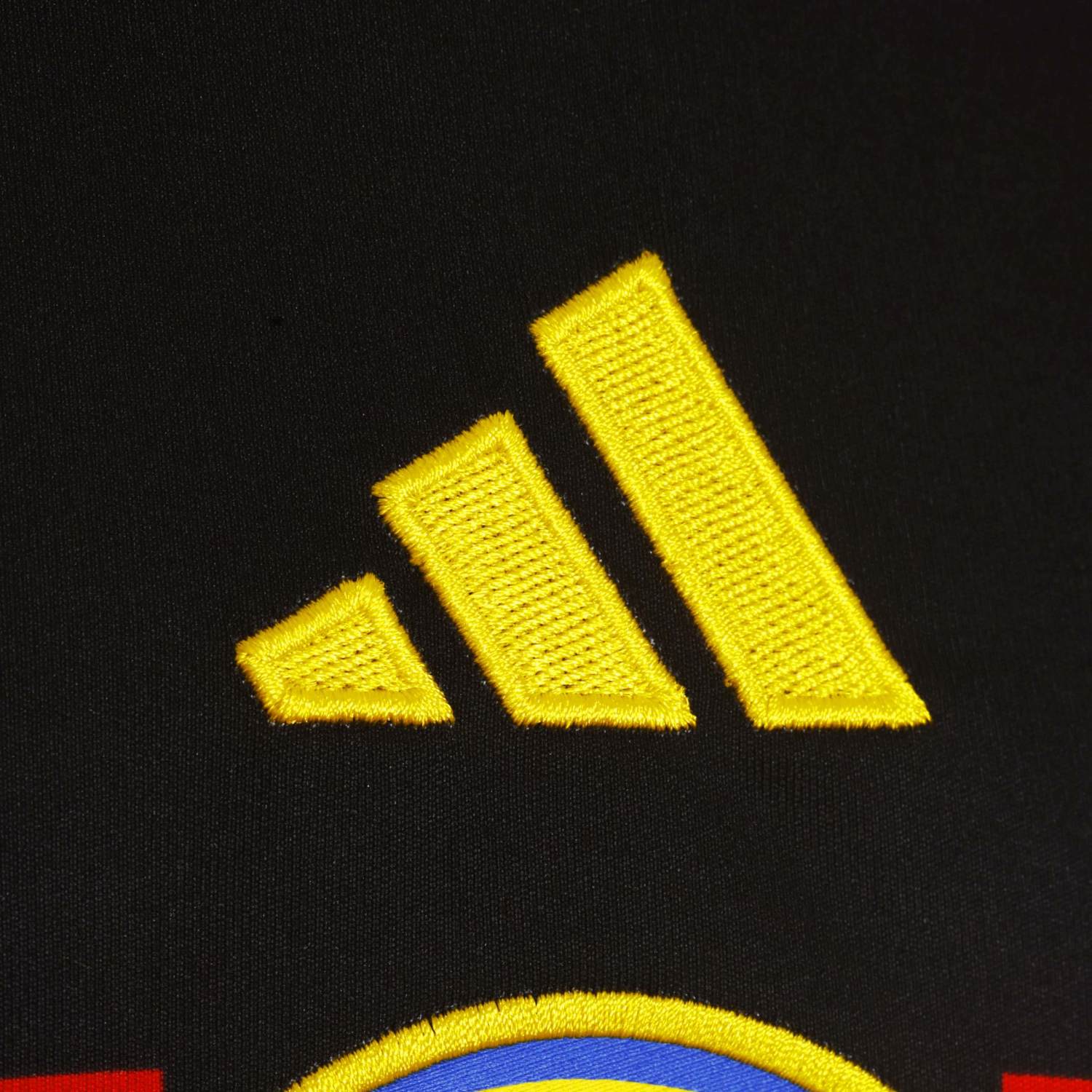 Close-up of the Club America logo on the youth soccer jersey