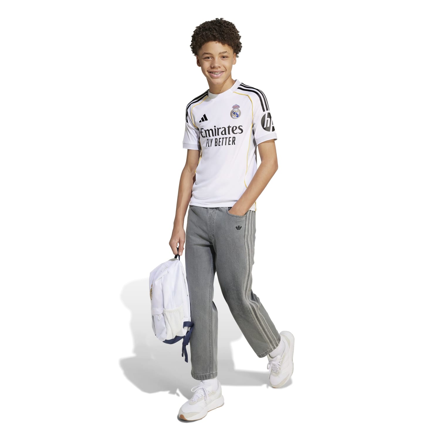 Front view of Real Madrid youth 25/26 replica home jersey for kids, showing team logo and design details