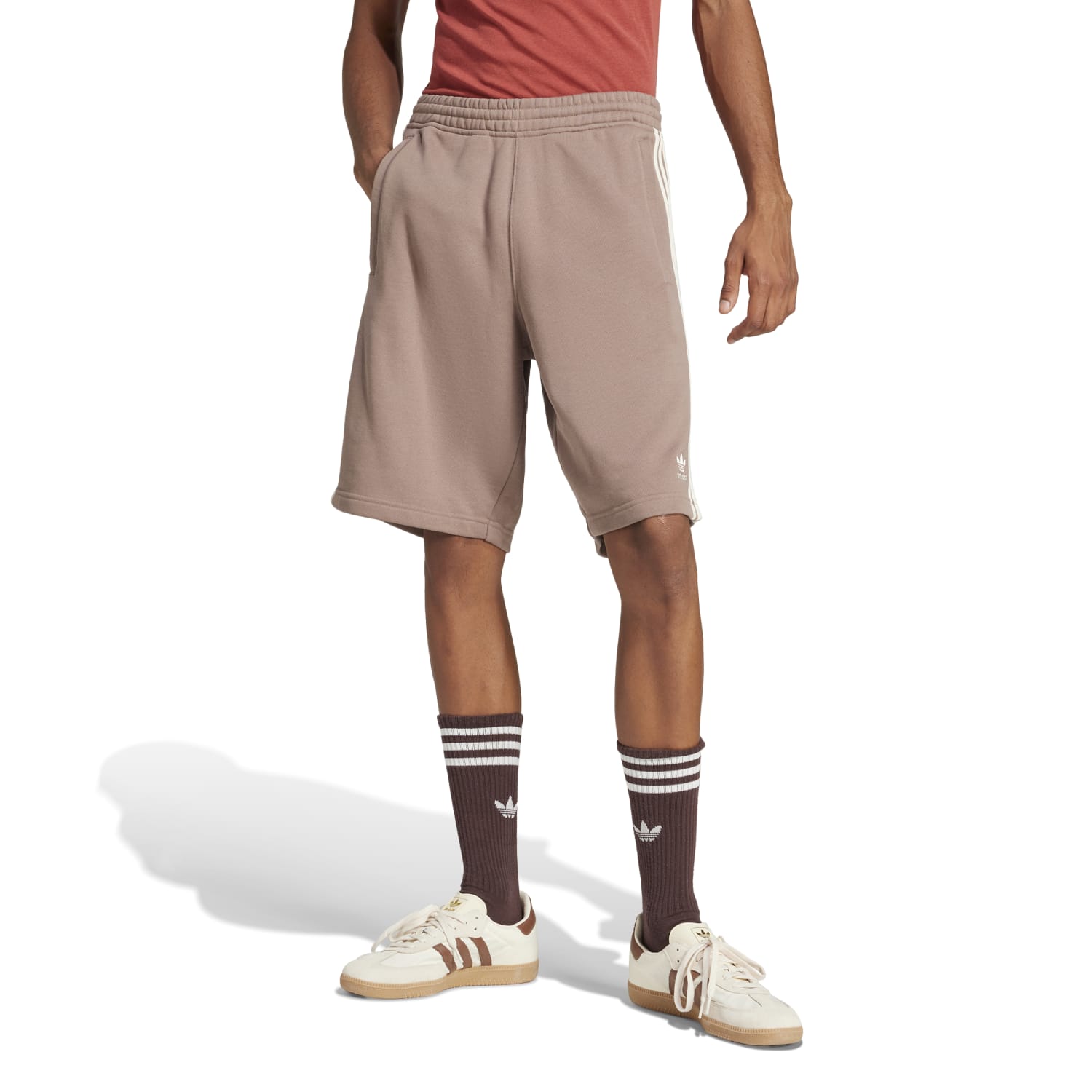 Side view of Adidas 3-Stripes shorts in action during a workout.