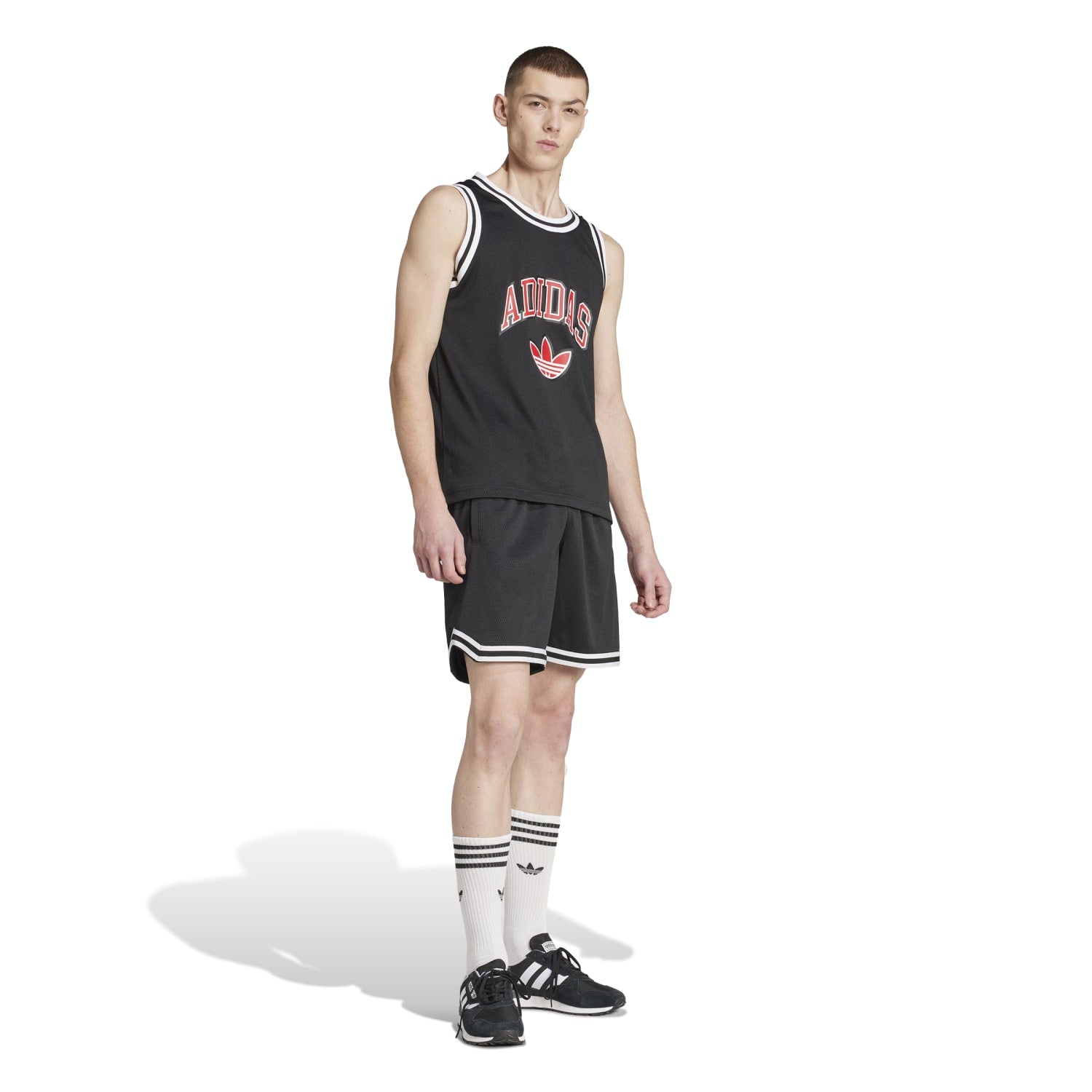 Model wearing a basketball tank for men during training, highlighting style and mobility