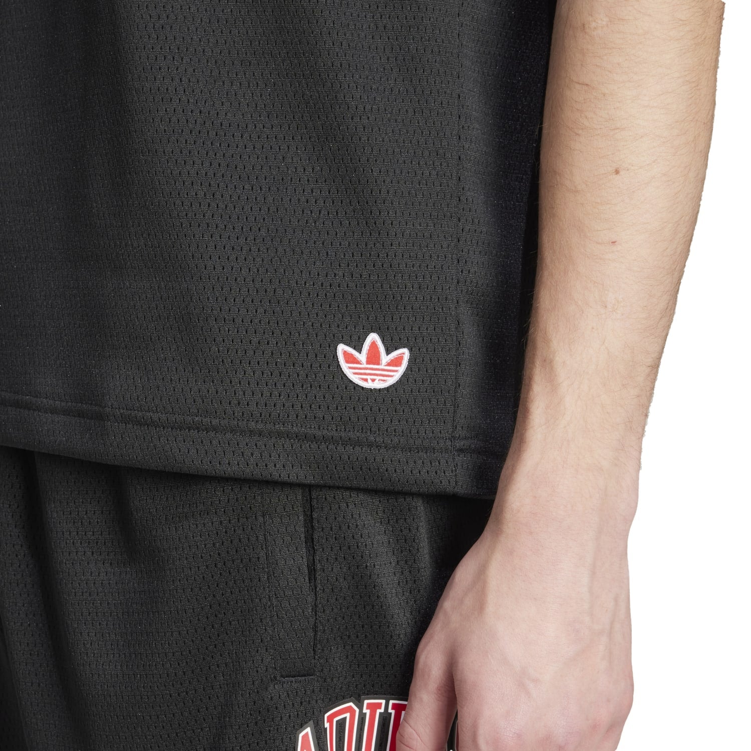 Close-up of the mens basketball clothing, showcasing fabric quality and fit