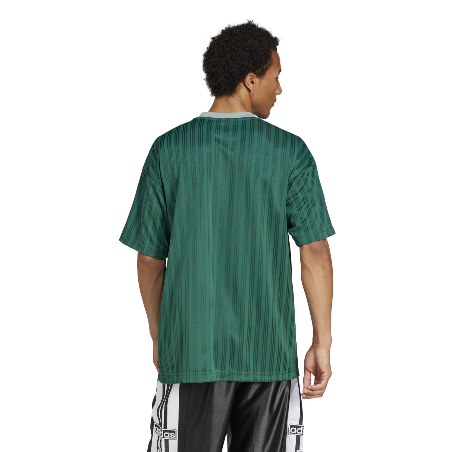 Close-up of the recycled polyester fabric texture and ribbed crew neck on this best adidas clothing for workouts
