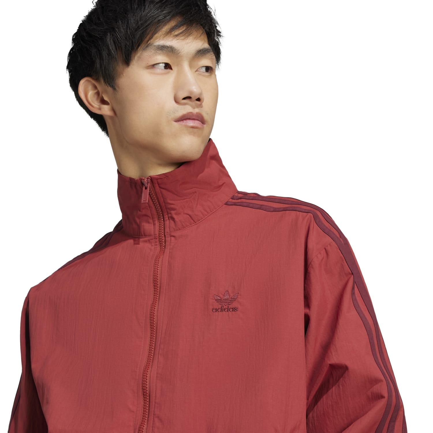 Front view of Adidas vintage mens track jacket showcasing the iconic three-stripe design.