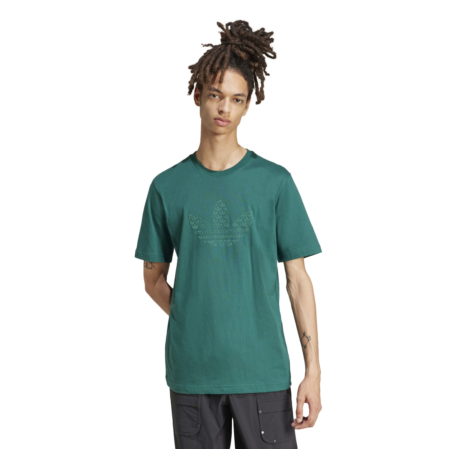 Side angle showcasing the loose fit of the Adidas Monogram Mens Tee, ideal for comfort.