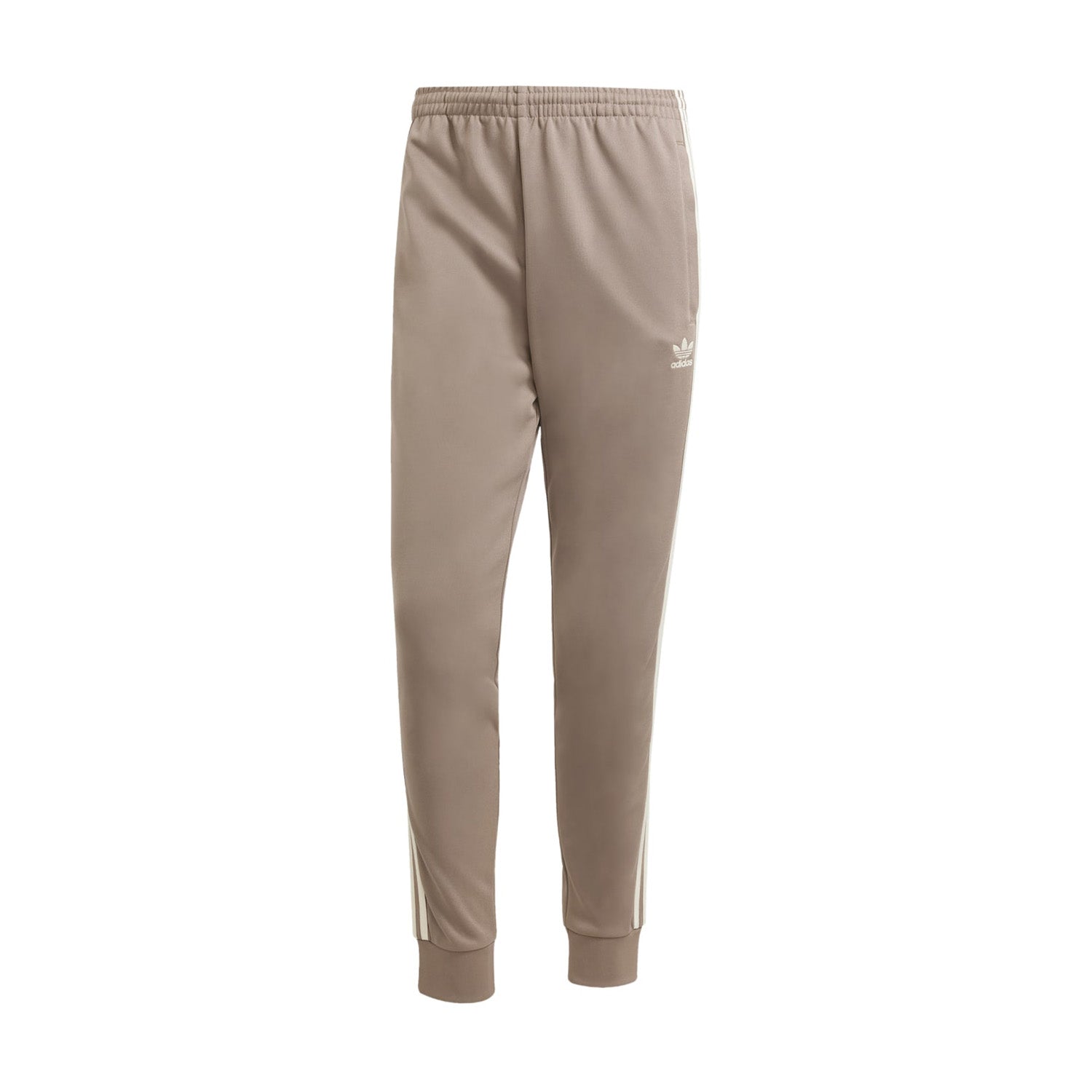 Close-up of the Adidas Superstar Slim Fit Track Pants showing the elastic waistband and stylish design. Close-up of the Adidas Superstar Slim Fit Track Pants showing the elastic waistband and stylish design.