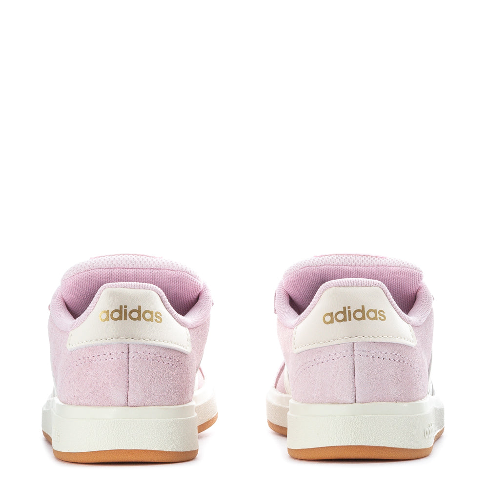 Kids wearing Adidas Grand Court 00s sneakers during outdoor play, demonstrating comfort and style