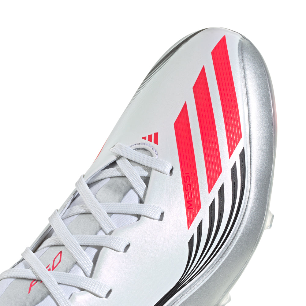 Player wearing Adidas Messi soccer cleats during a match, focusing on grip and comfort