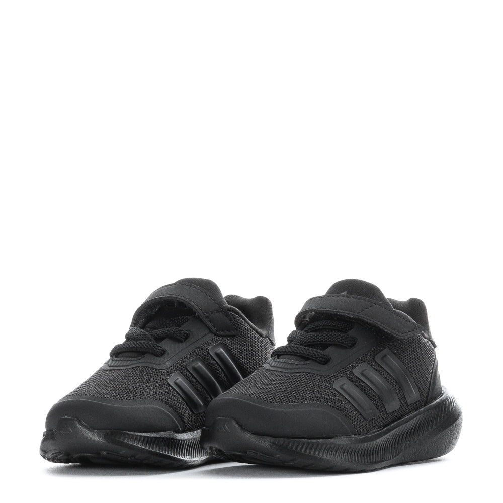 Young child walking confidently in stylish toddler sneakers