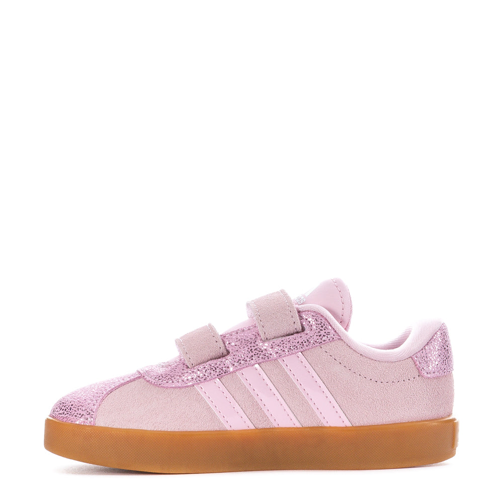 Children wearing Adidas toddler sneakers with Velcro, playing outside comfortably