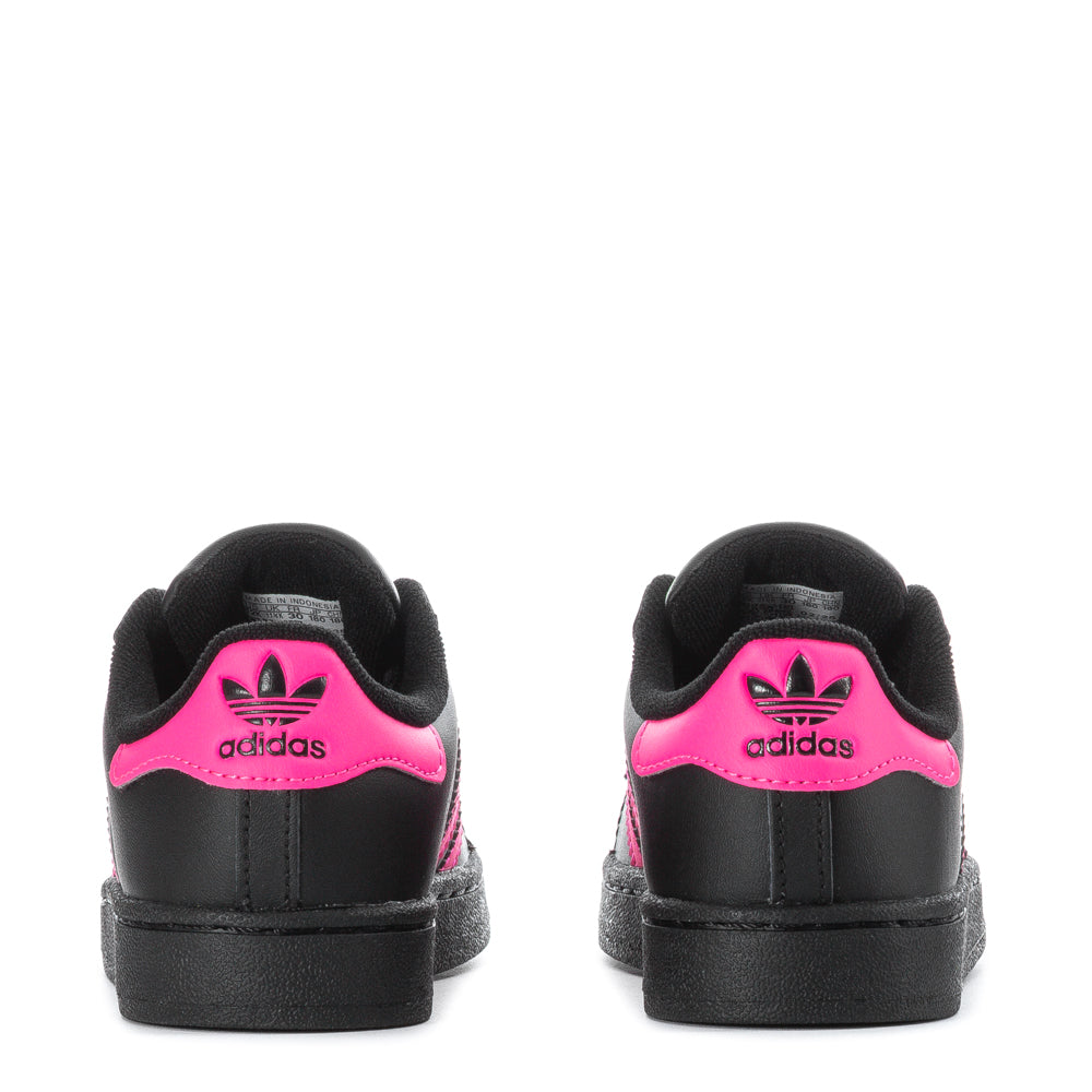 Close-up view of the Adidas Superstar II kids sneakers, highlighting the durable leather upper.