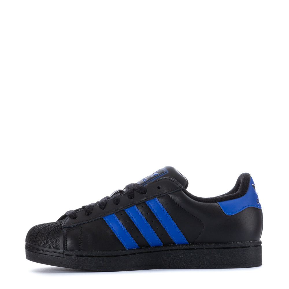 Side view of adidas superstar casual sneakers highlighting padded collar and leather upper