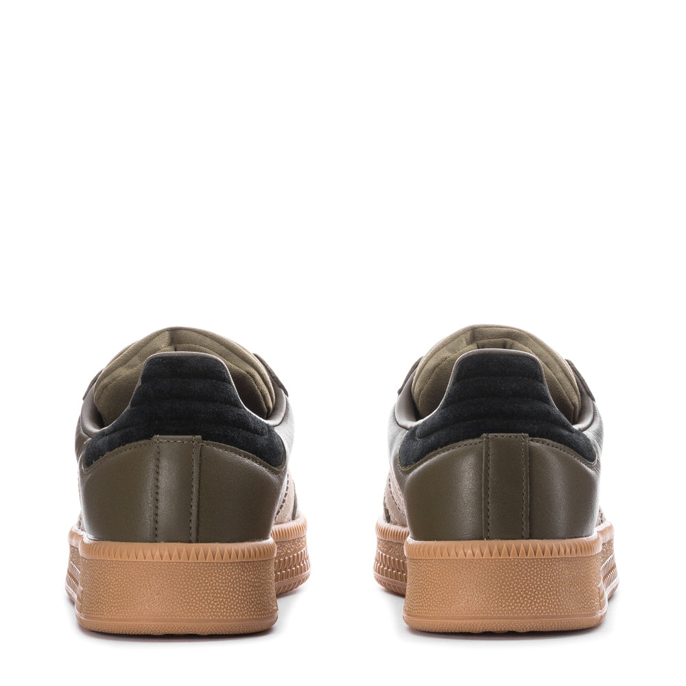 Top view of adidas Samba XLG mens sneakers showcasing classic lace closure and padded tongue.