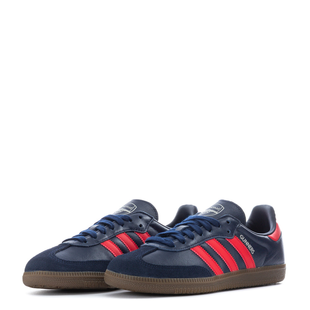 Side view of Adidas Samba OG sneakers highlighting the rubber cupsole