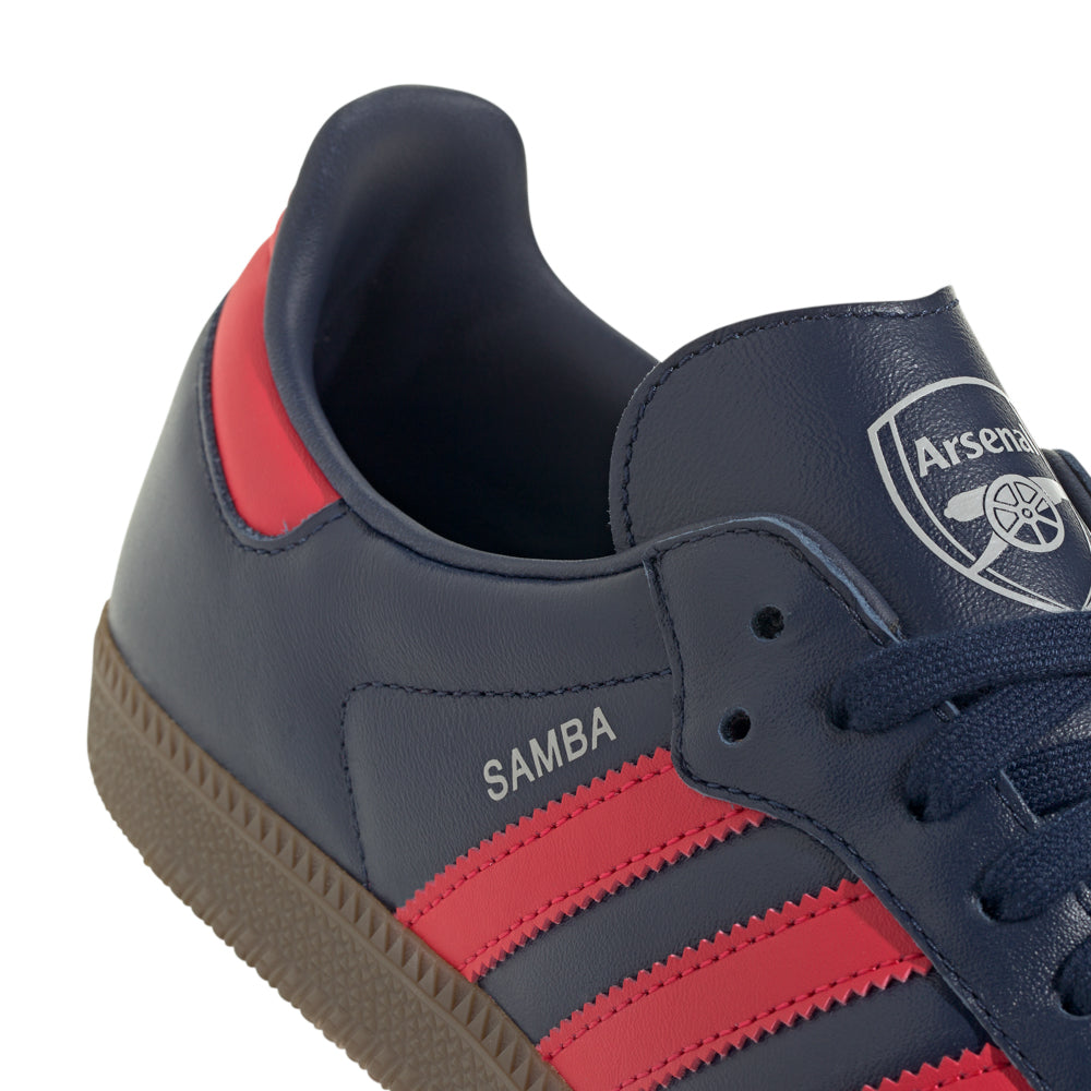 Side view of Adidas Samba OG sneakers highlighting the rubber cupsole