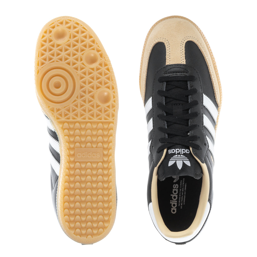 Close-up of Adidas Samba OG youth sneakers showing leather and suede details
