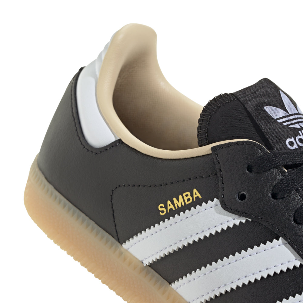 Close-up of Adidas Samba OG youth sneakers showing leather and suede details