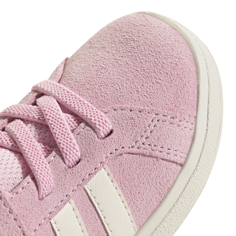Young child happily walking in comfortable toddlers shoes