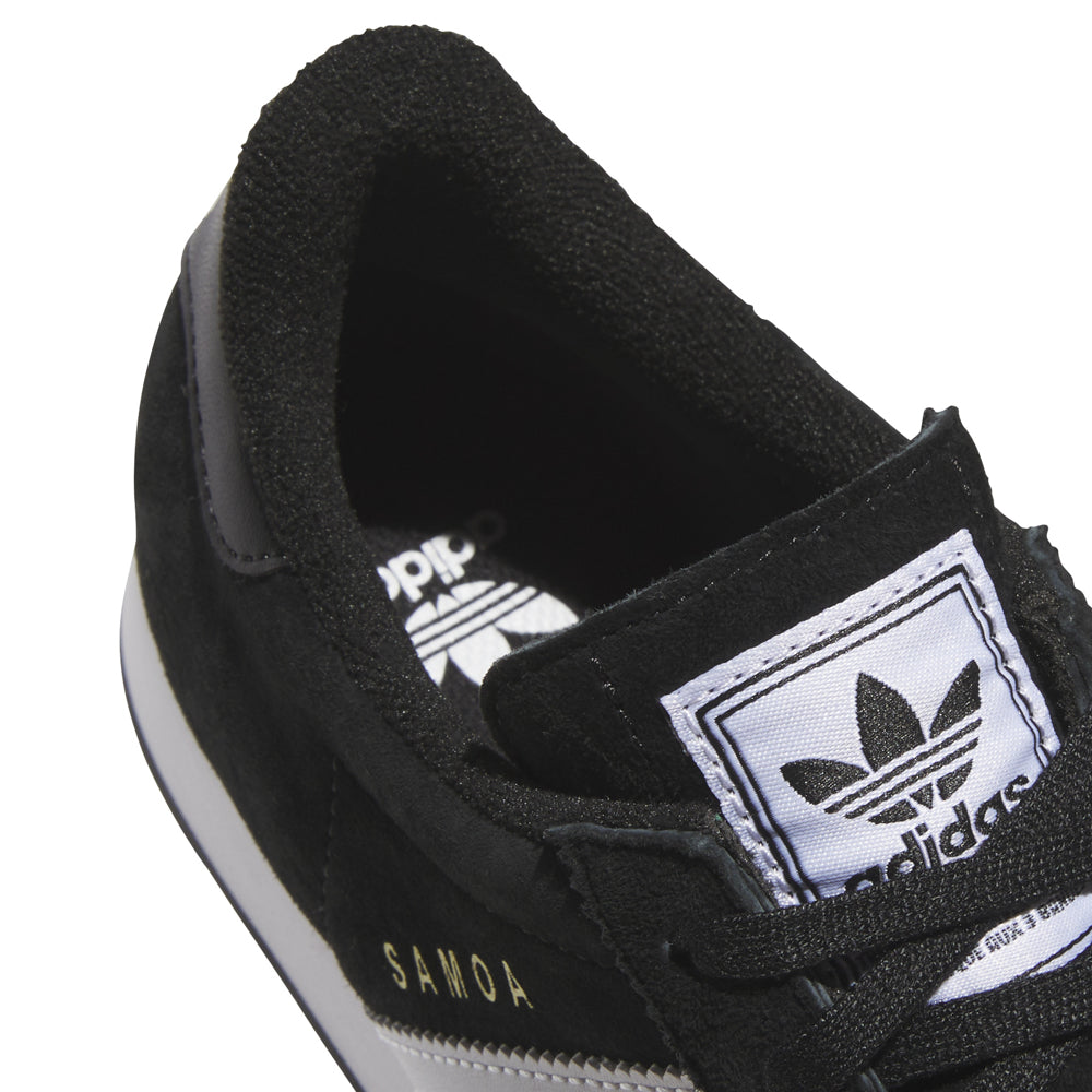 Side view of adidas Samoa youth sneakers highlighting cushioning and design