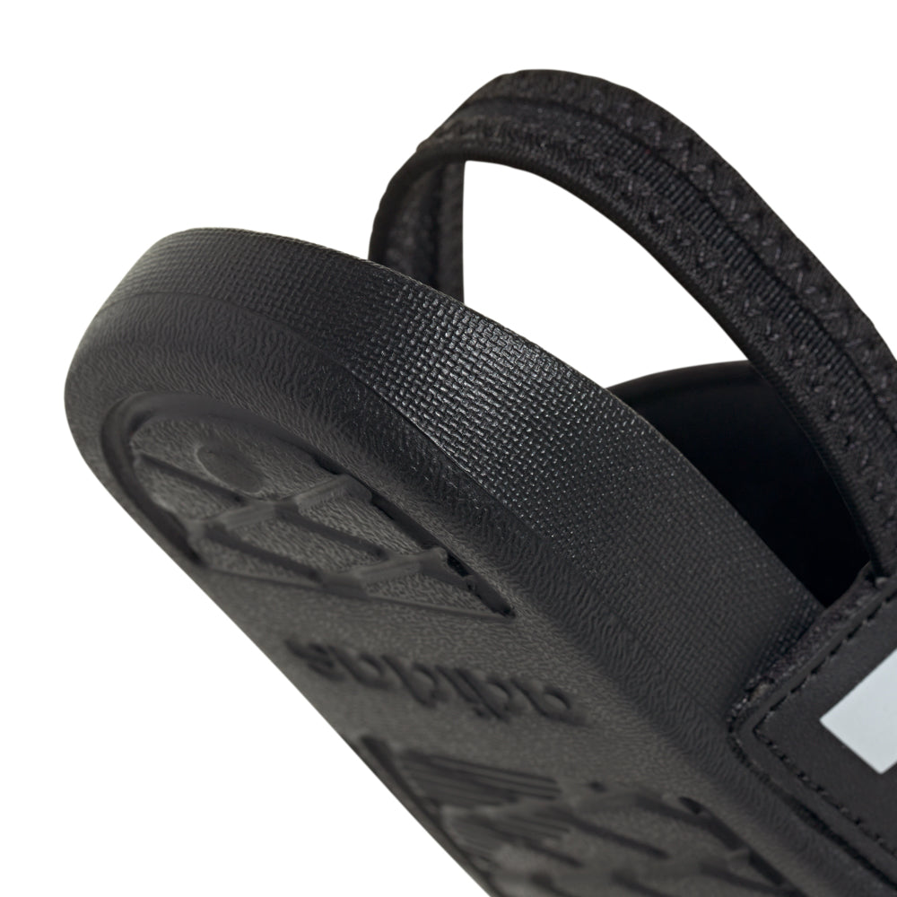 Close-up of Adidas Adilette Estrap toddler slides showing slip-on design