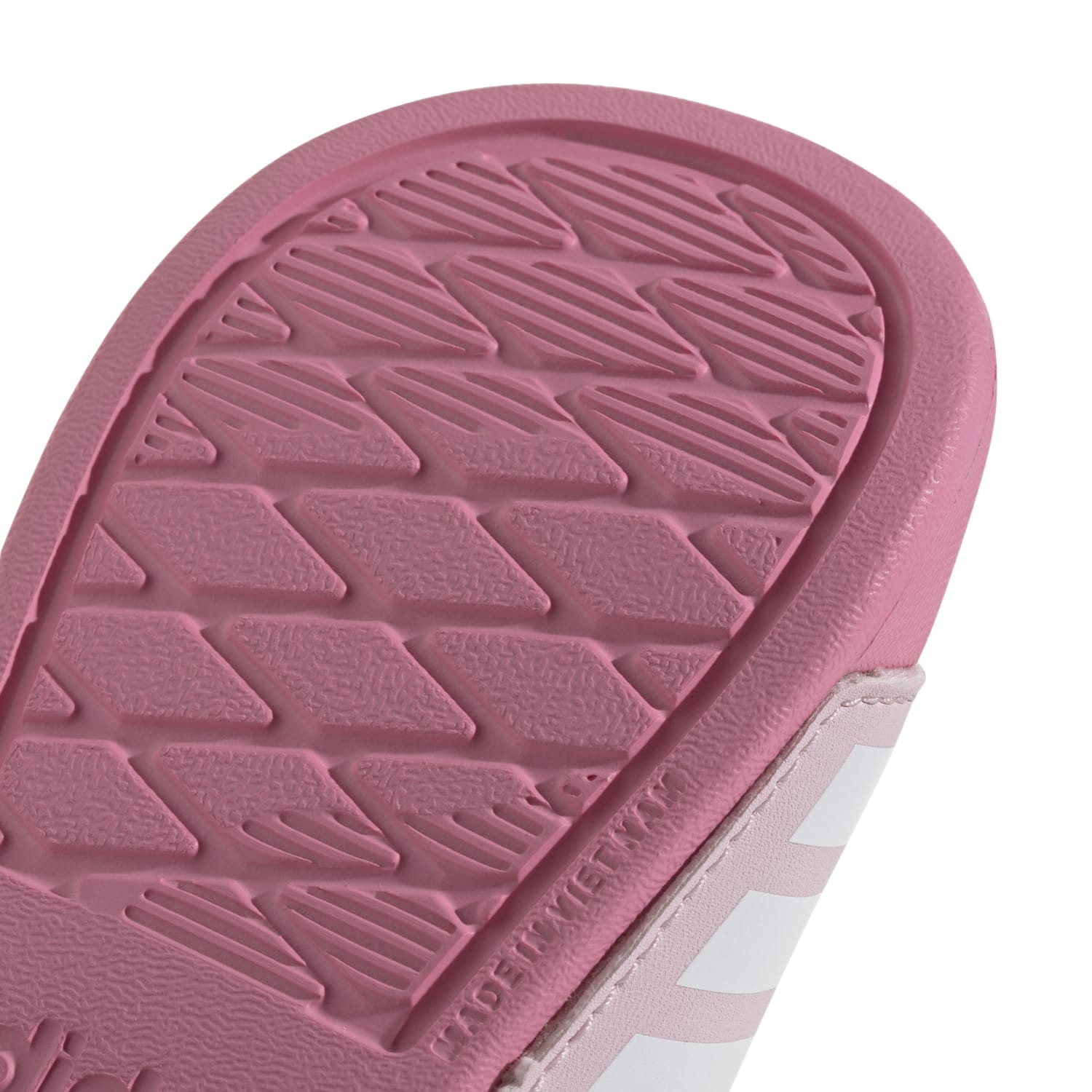 Toddler wearing Adidas Adilette Estrap slides during summer play