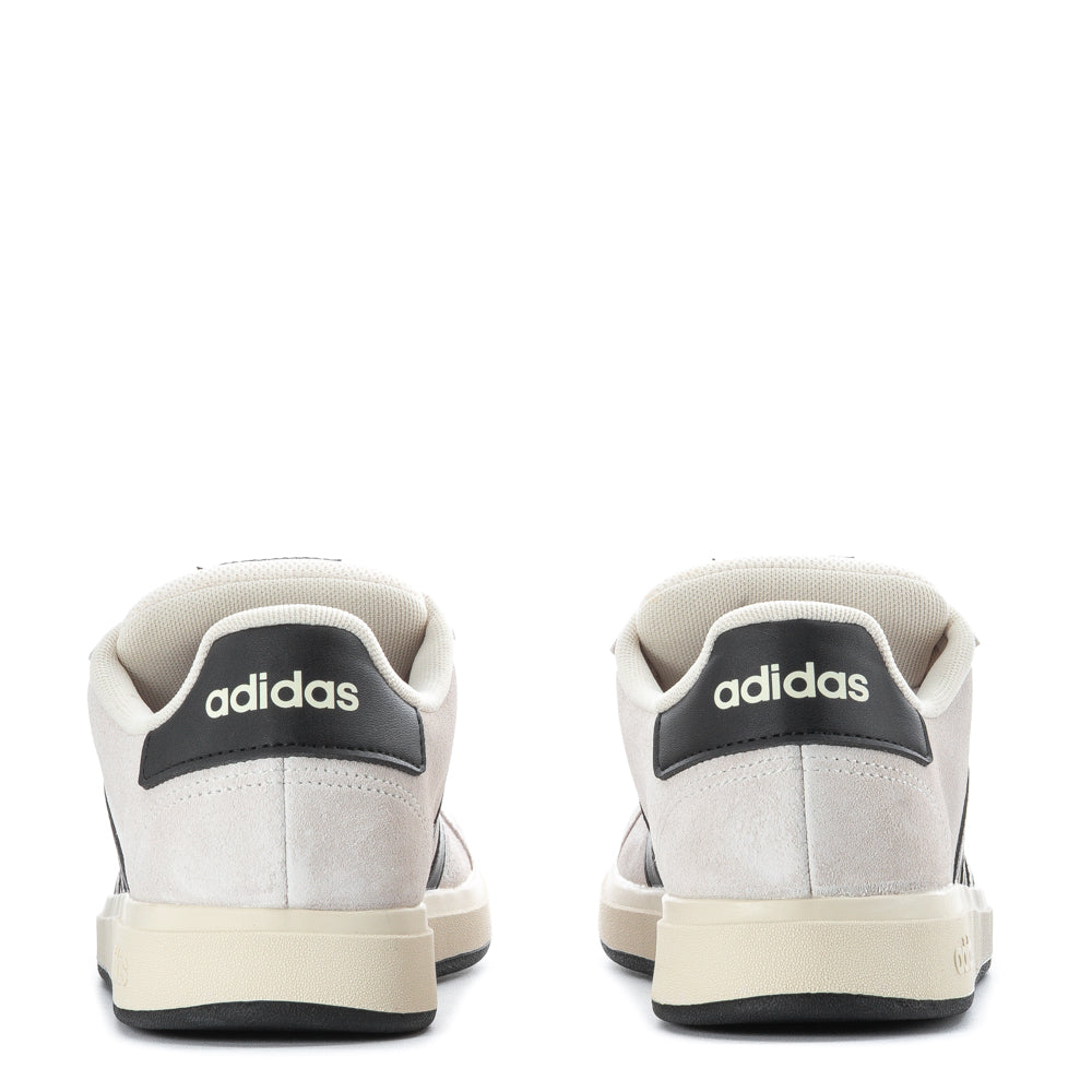 Child running in the park wearing comfortable kids shoes suitable for active play
