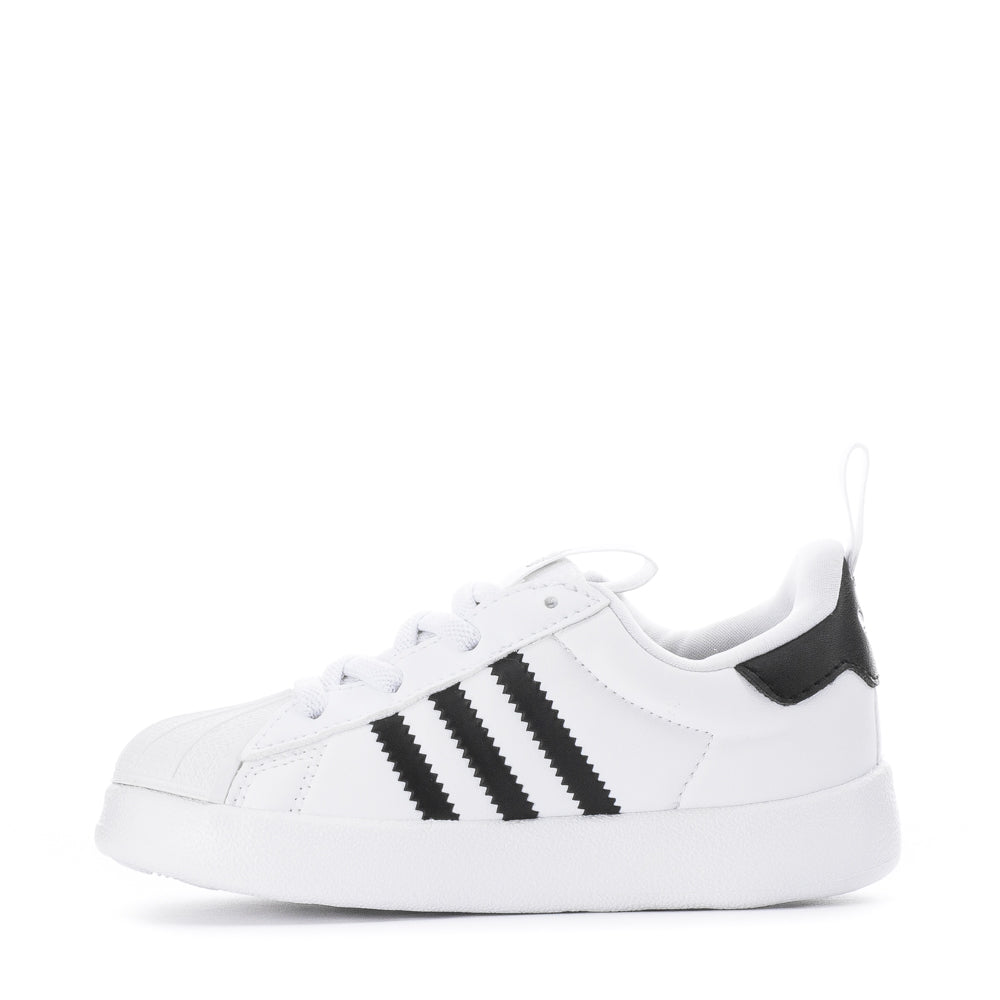 Close-up of toddler toes inside durable rubber shell toe for extra protection during walking
