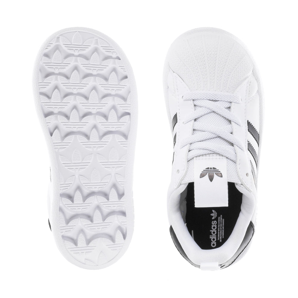 Side-angle view of LittleStride 360 leather toddler shoes showing padded collar and breathable mesh lining
