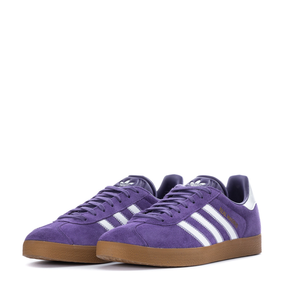 Lifestyle shot of Adidas Gazelle sneakers being worn in casual setting