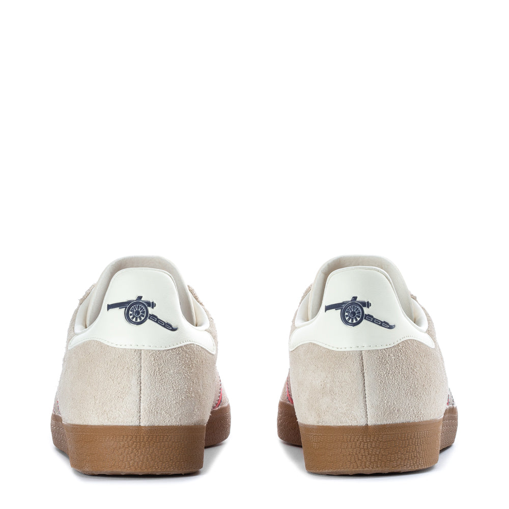 Side view of Adidas Gazelle mens sneakers, highlighting the lace closure and low-profile design.