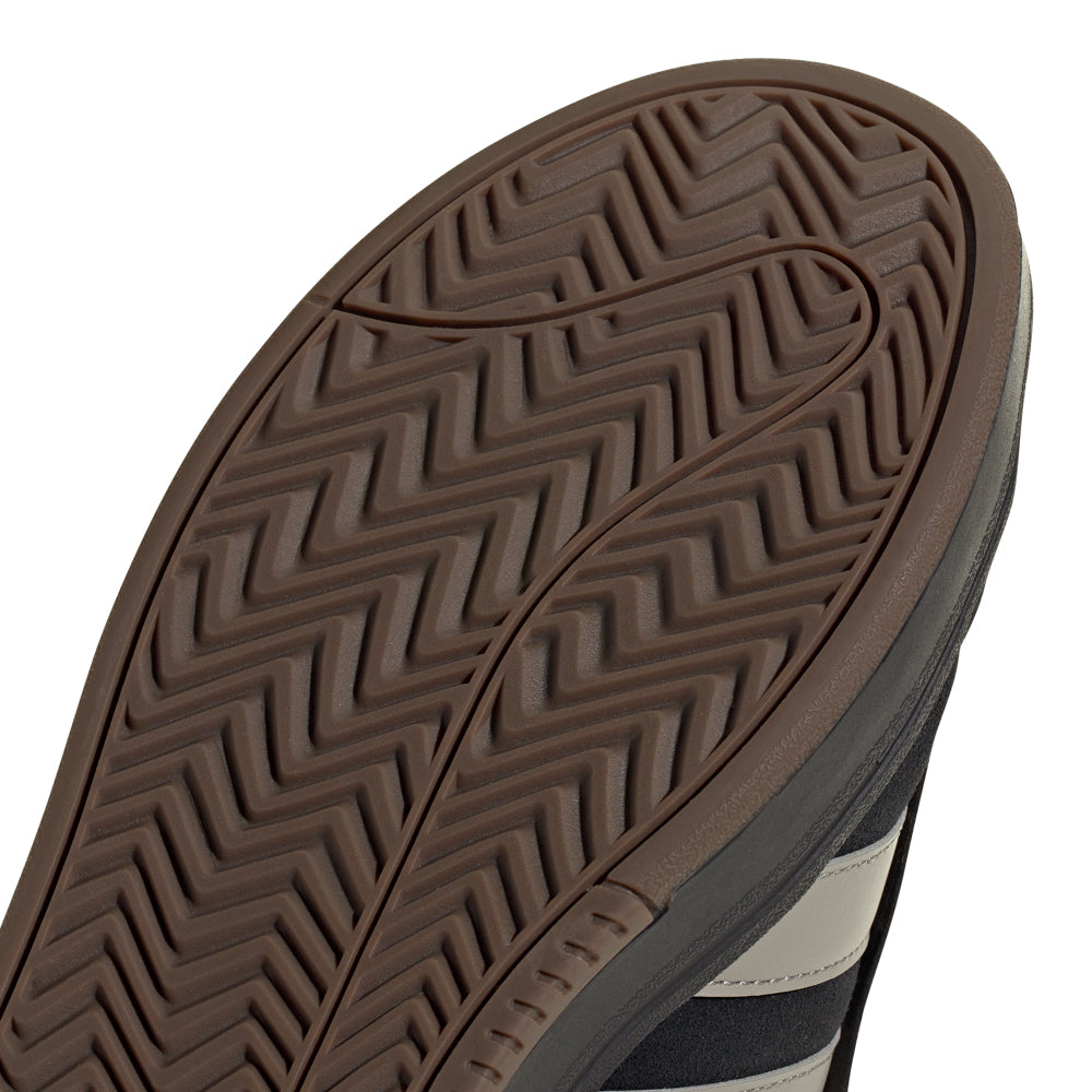 Alpha Court Classic sneakers in black and white, perfect for casual outings.