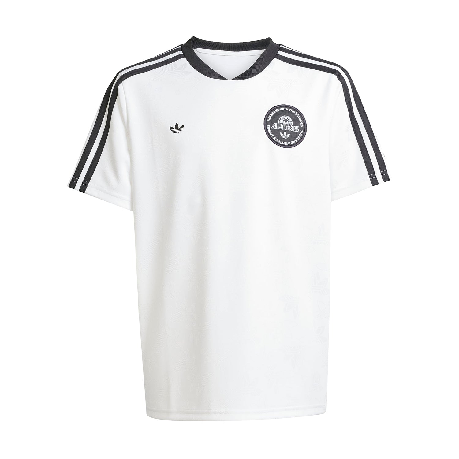 Youth active sport tee in a dynamic pose during an outdoor game.