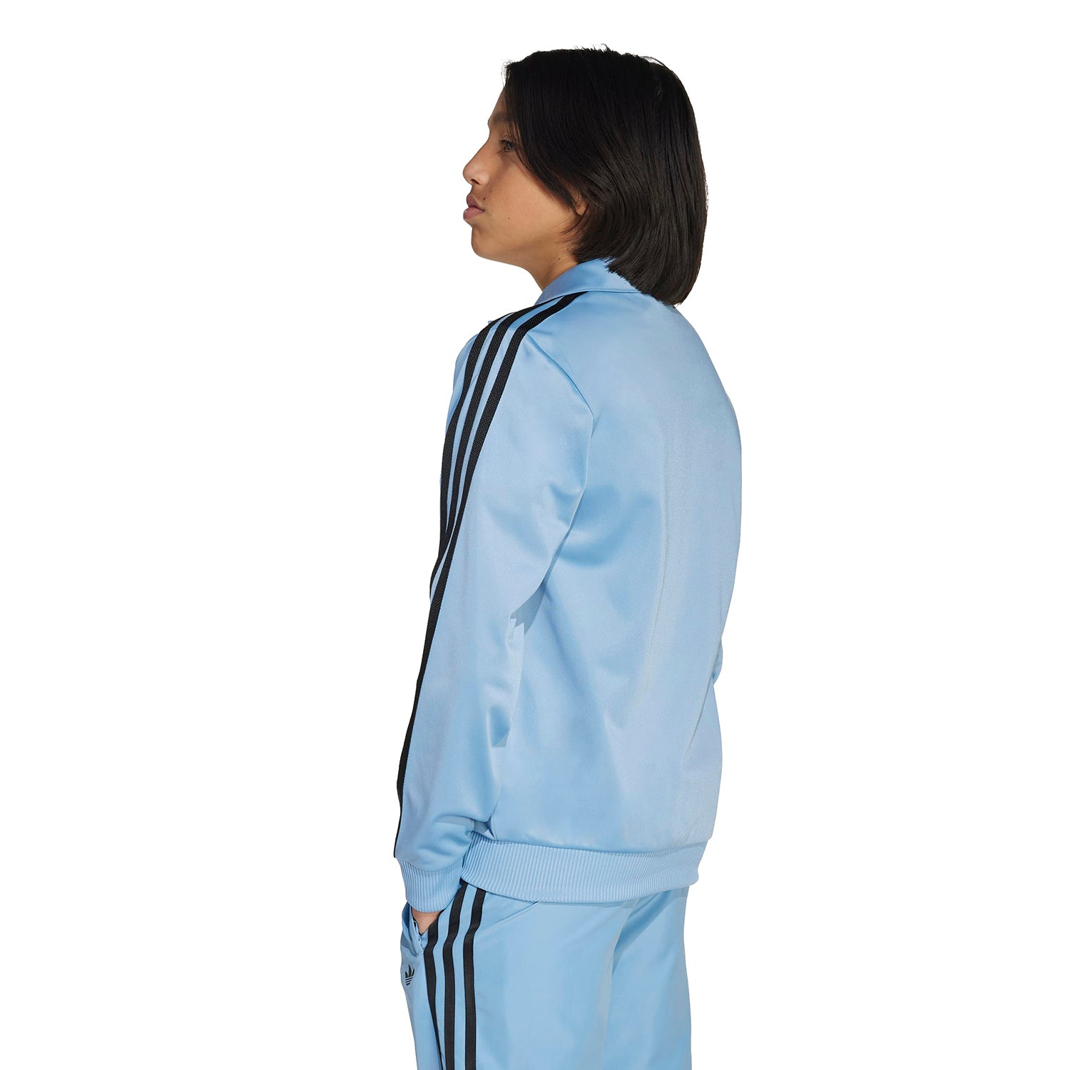 Close-up of the zipper and fabric texture of the athletic jacket.