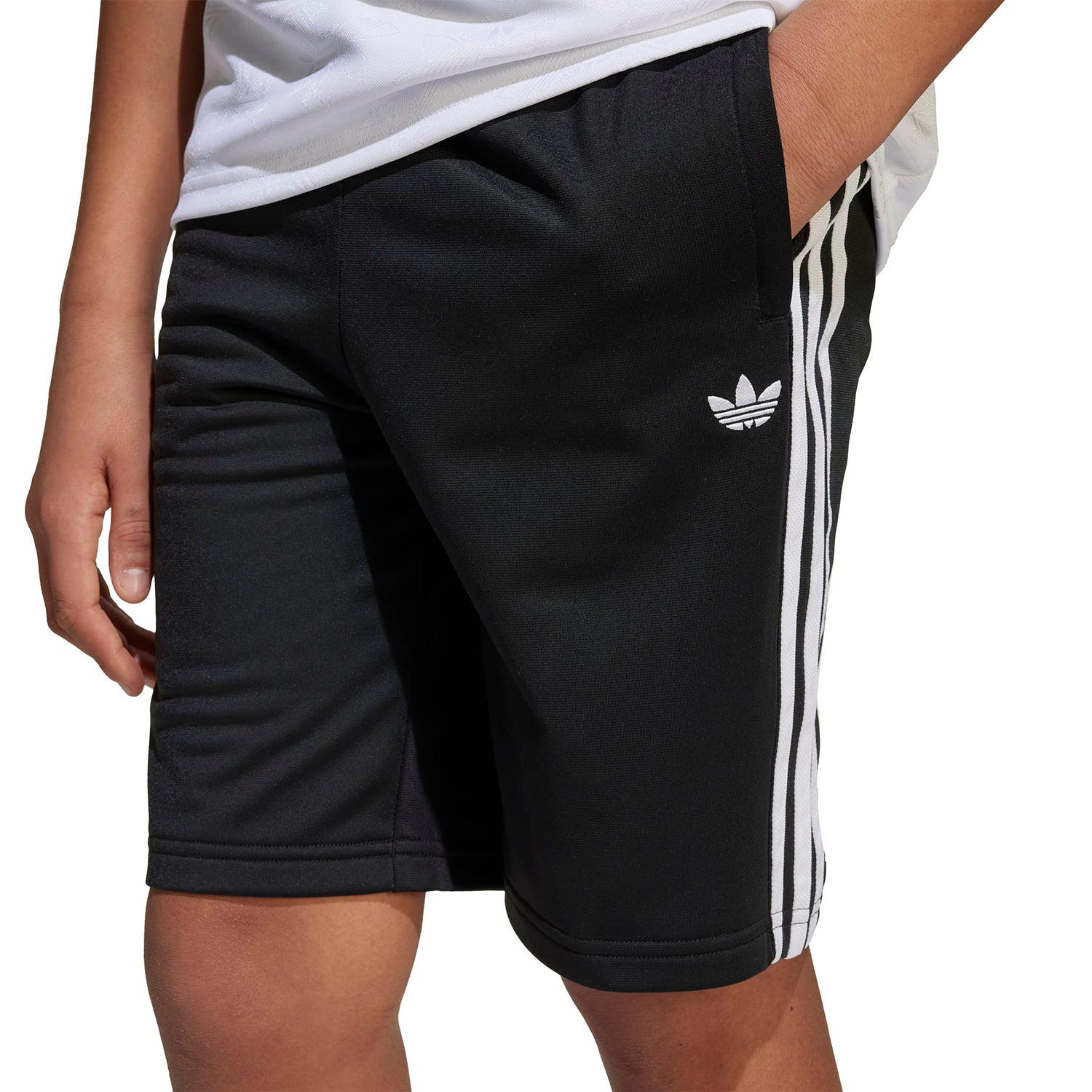 Youth athlete in performance shorts during soccer game